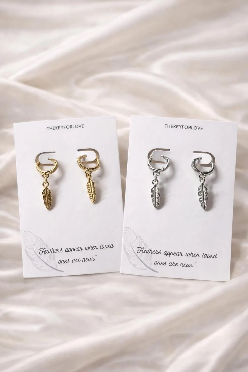Feather huggie hoop earrings