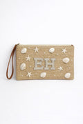 Beige woven clutch holiday beach club bag with shell patches