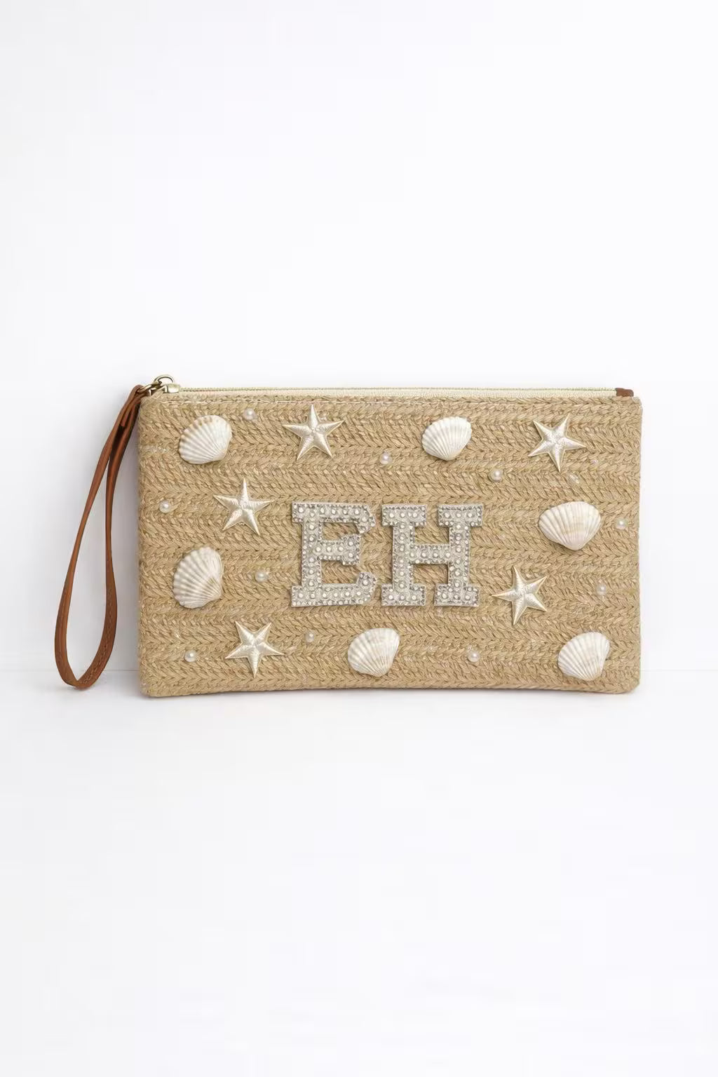 Beige woven clutch holiday beach club bag with shell patches